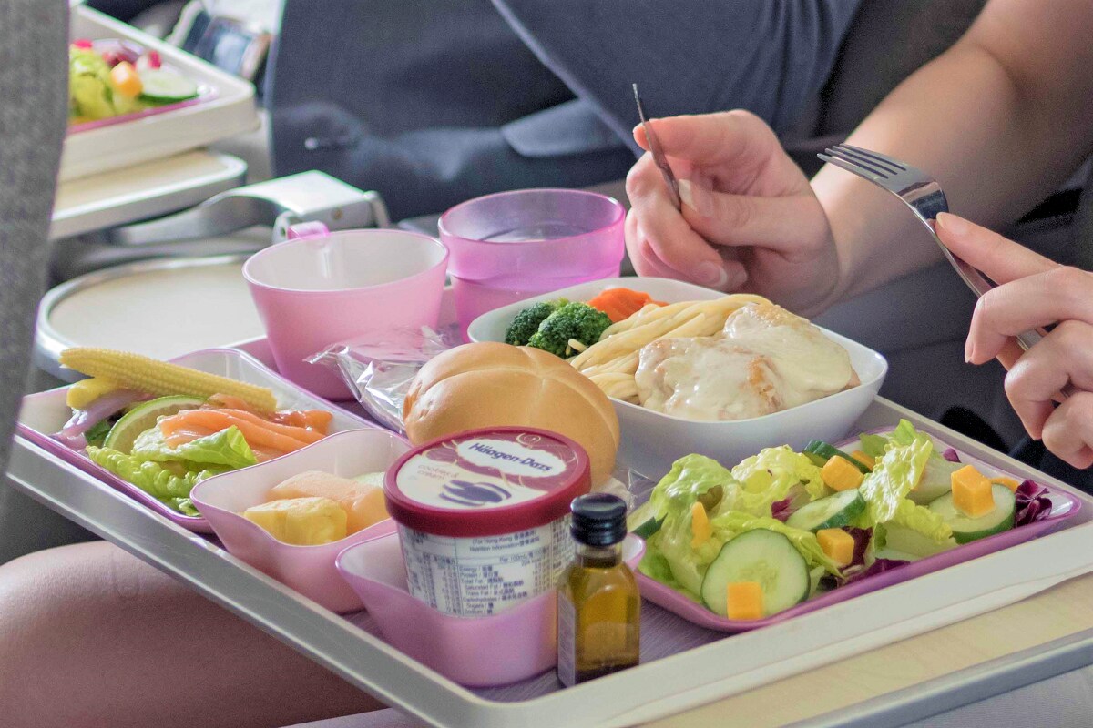 Passengers eating in Premium Economy Class