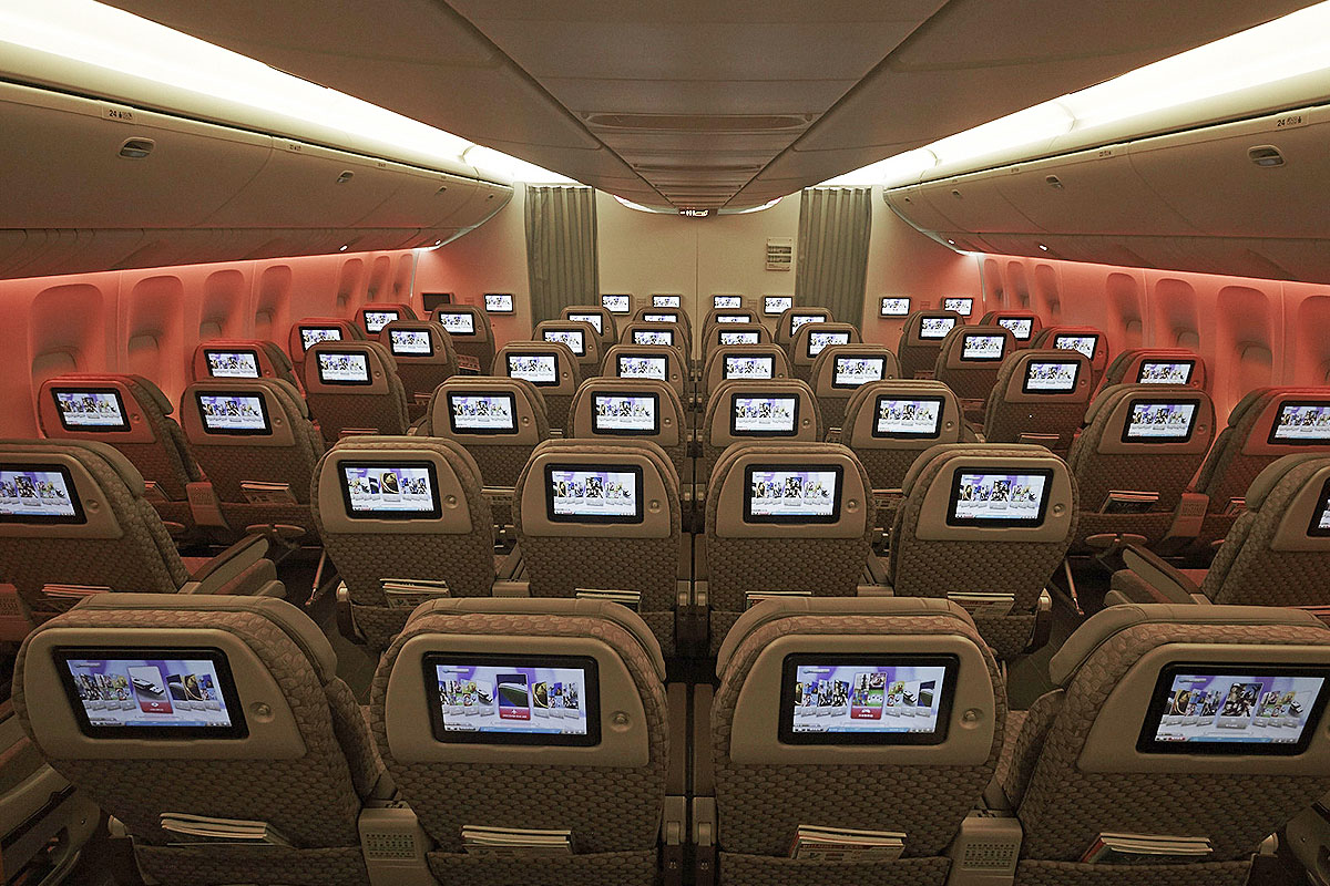 Passengers enjoying in Premium Economy Class