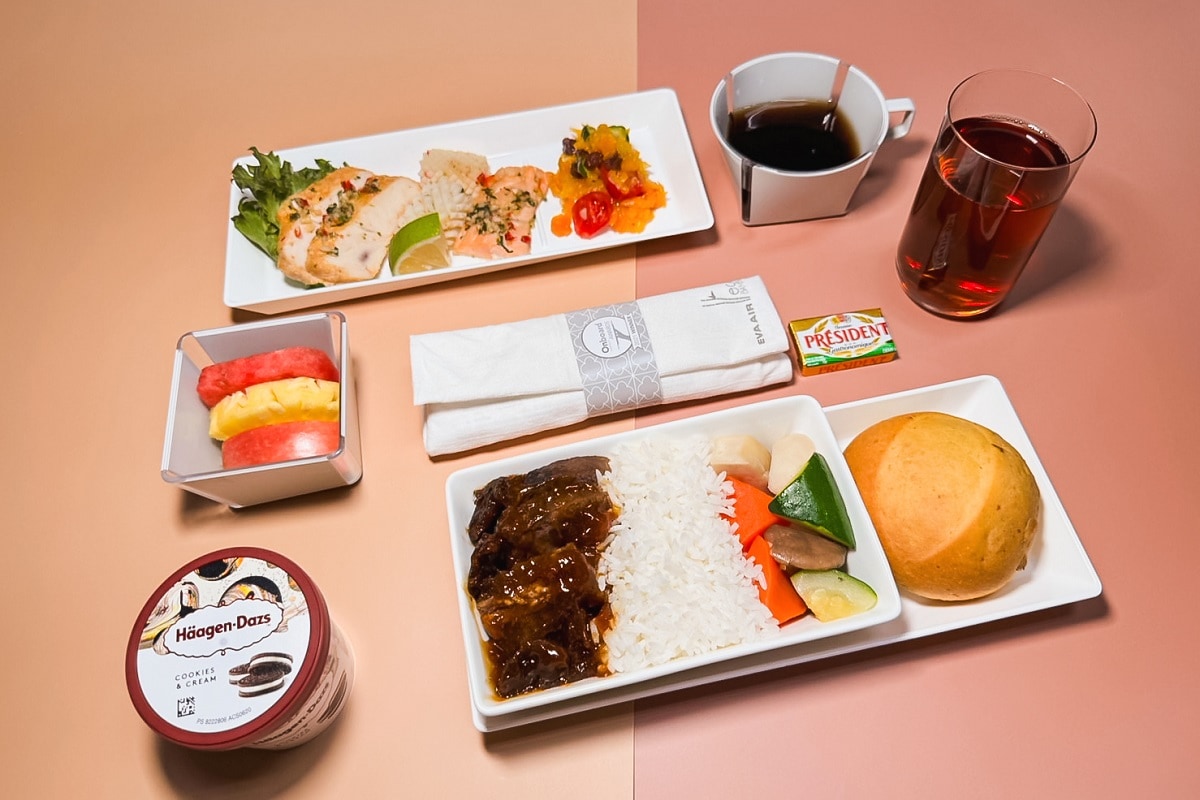 Passengers eating in Premium Economy Class